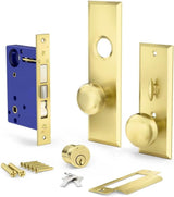Mortise apartment entry lockset components: lock body, exterior and interior brass plates with knobs, cylinder, keys, strike and screws