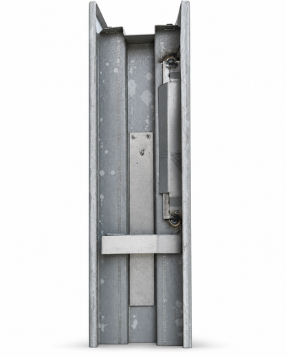 Back of a welded steel frame jamb with hinge reinforcement and wall anchor