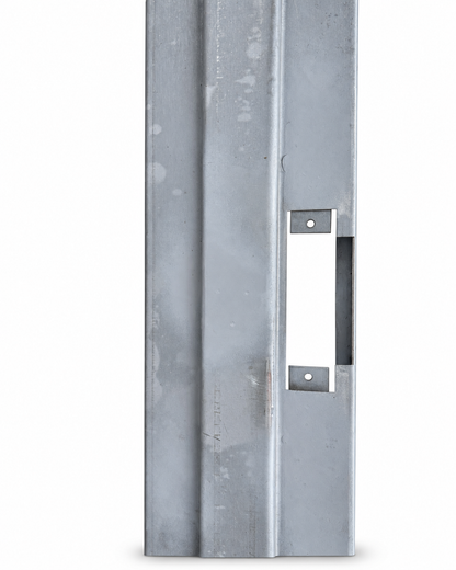 Strike cutout on the lock jamb of a welded steel door frame