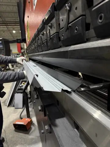 UFD press brake forming a steel door frame in our New York factory